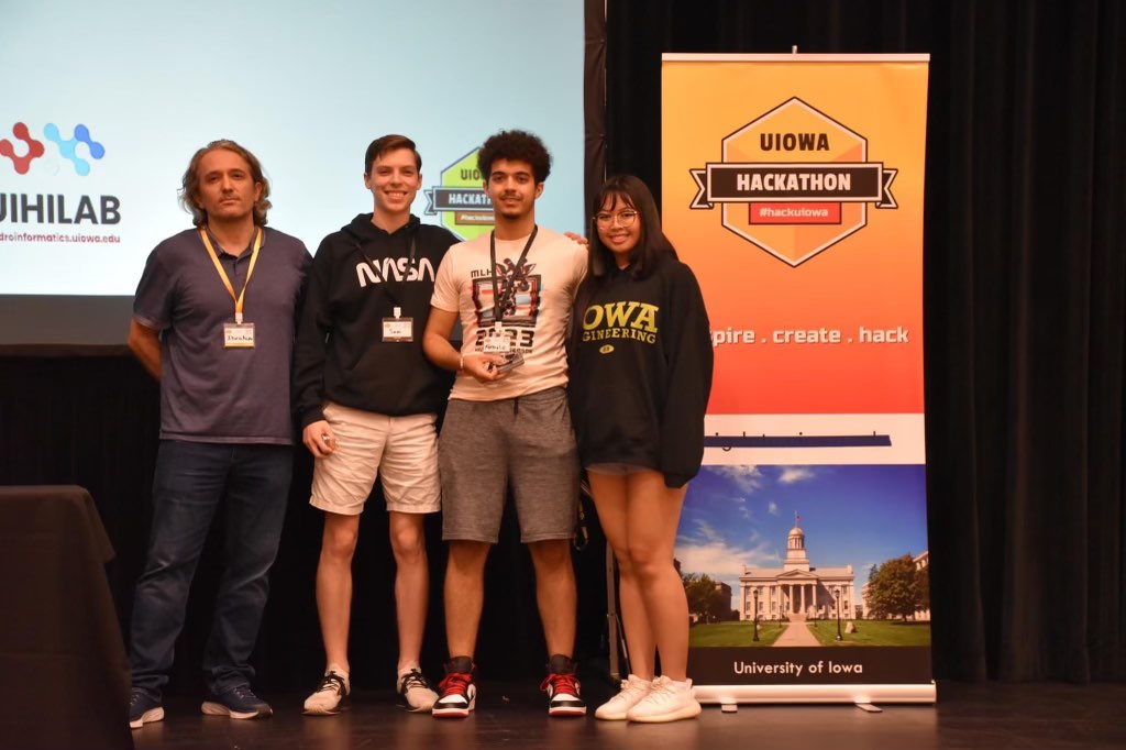 Maximelio Finch and team members Sam Witte, Sirena Backham winning UIowa's 2023 Hackathon